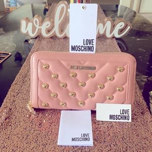 Love Moschino pink wallet.
